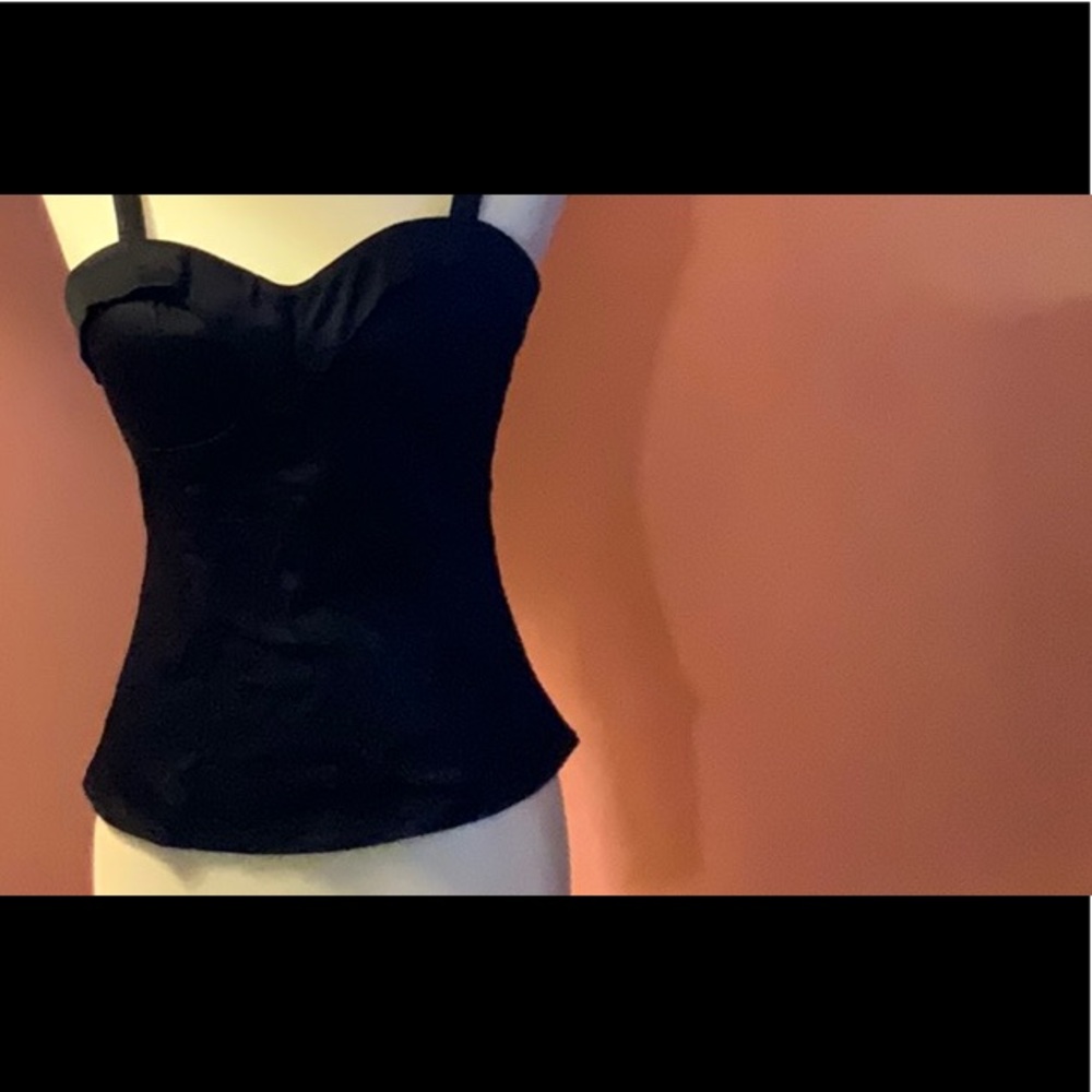 One Vixen by Micheline Pitt Maneater top in black.